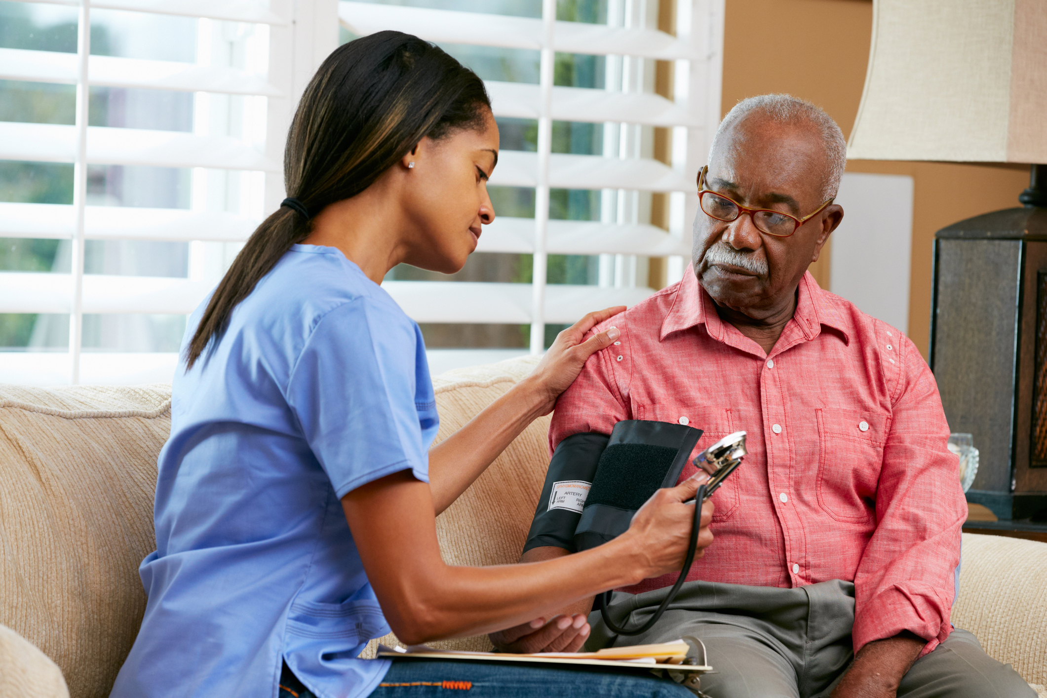 Man getting blood pressure taken.